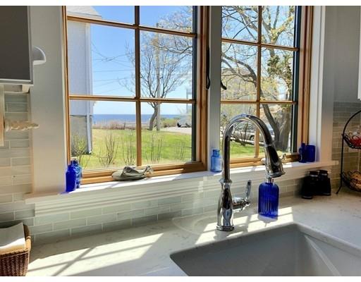 12 Long Beach Road Gloucester, MA 01930 - Photo 5 of 30 a room with large windows and view of couch