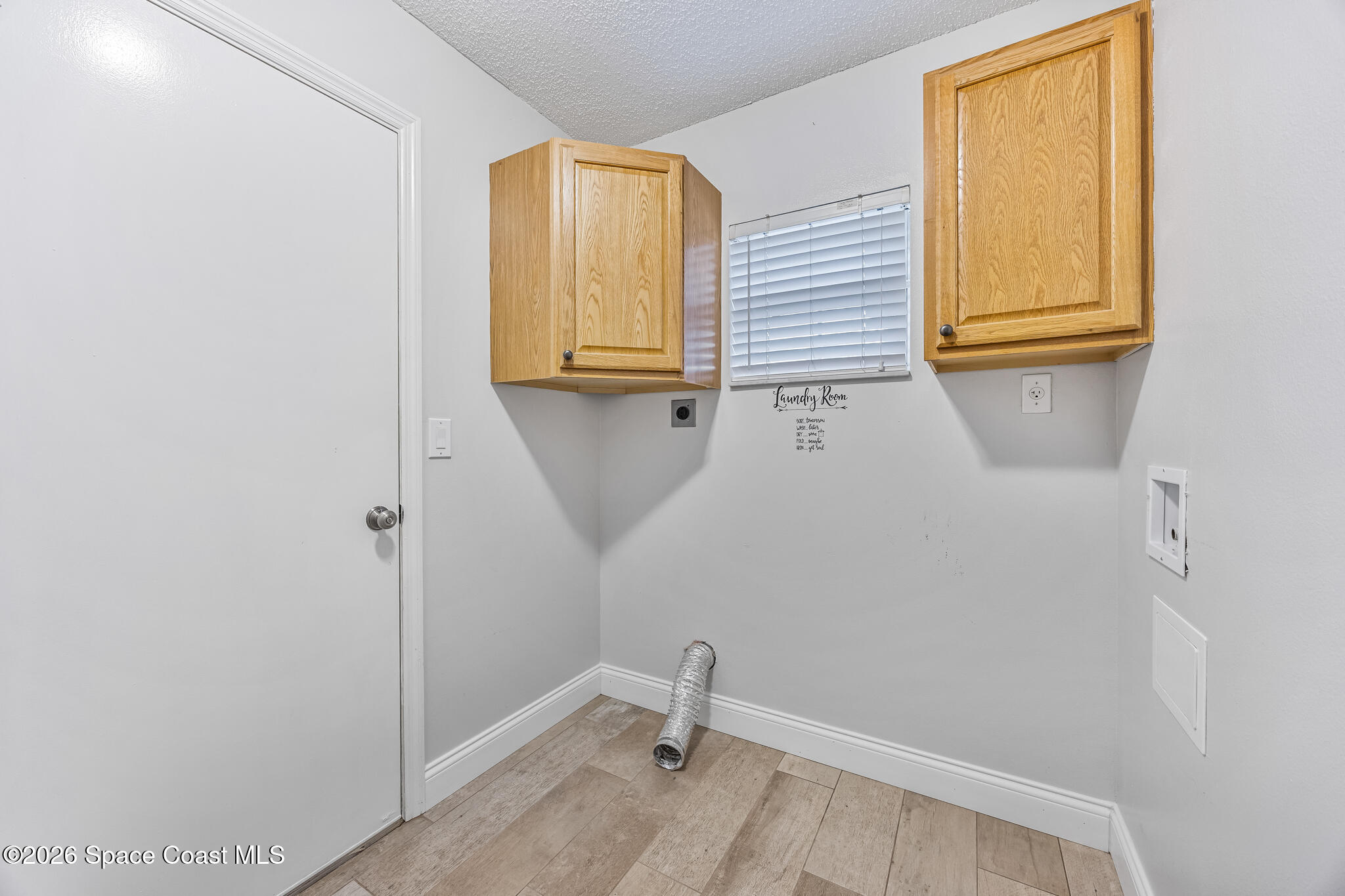 6185 Degan Road Cocoa, FL 32927 - Photo 25 of 30 a view of walk in closet