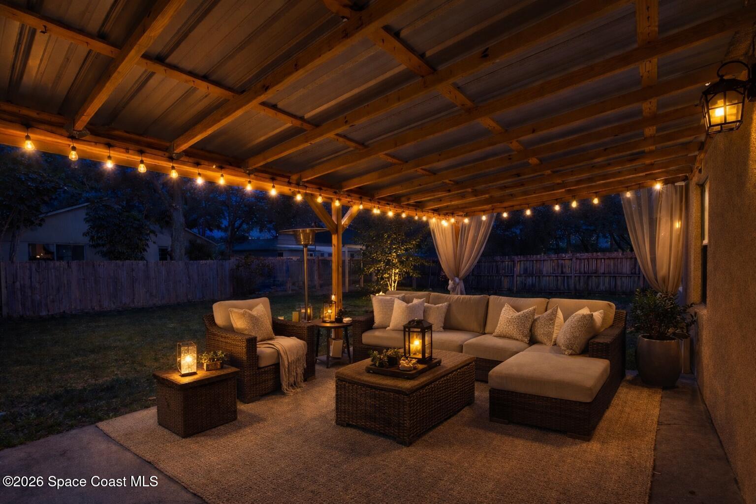 6185 Degan Road Cocoa, FL 32927 - Photo 27 of 30 a outdoor living space with patio furniture and a fireplace