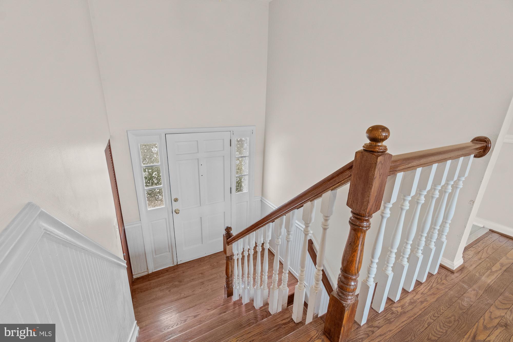 17124 Butler Road Poolesville, MD 20837 - Photo 32 of 58 Hardwood floors on stairs and landings