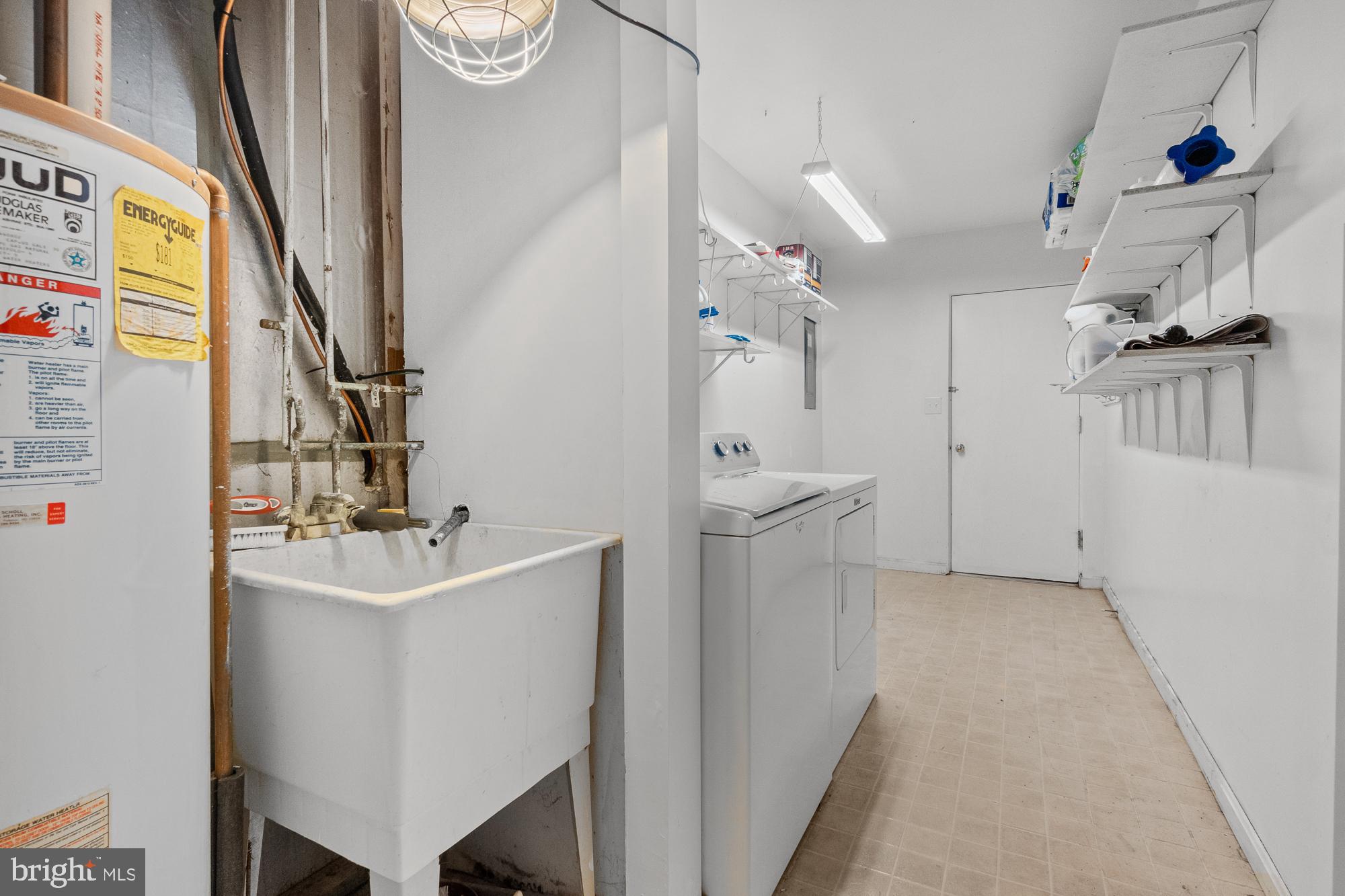 17124 Butler Road Poolesville, MD 20837 - Photo 41 of 58 Utility Room for laundry, sink, and gas furnace!