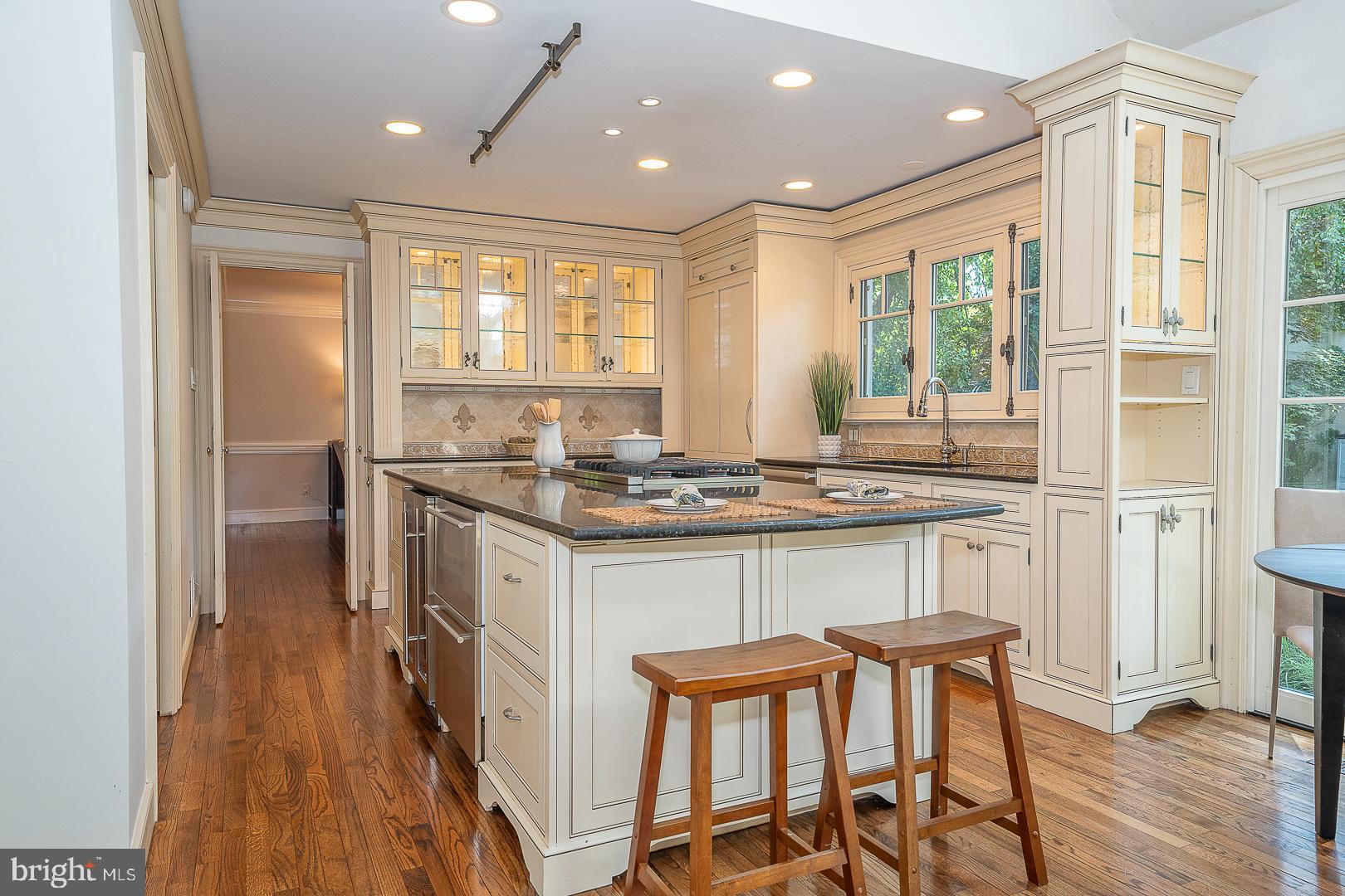 447 Inveraray Road Villanova, PA 19085 - Photo 14 of 71 a kitchen with granite countertop a sink stove and refrigerator