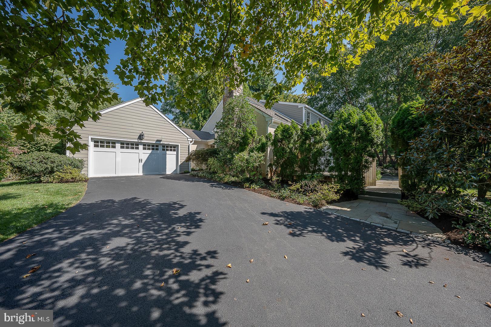 447 Inveraray Road Villanova, PA 19085 - Photo 2 of 71 a front view of a house with a yard and garage