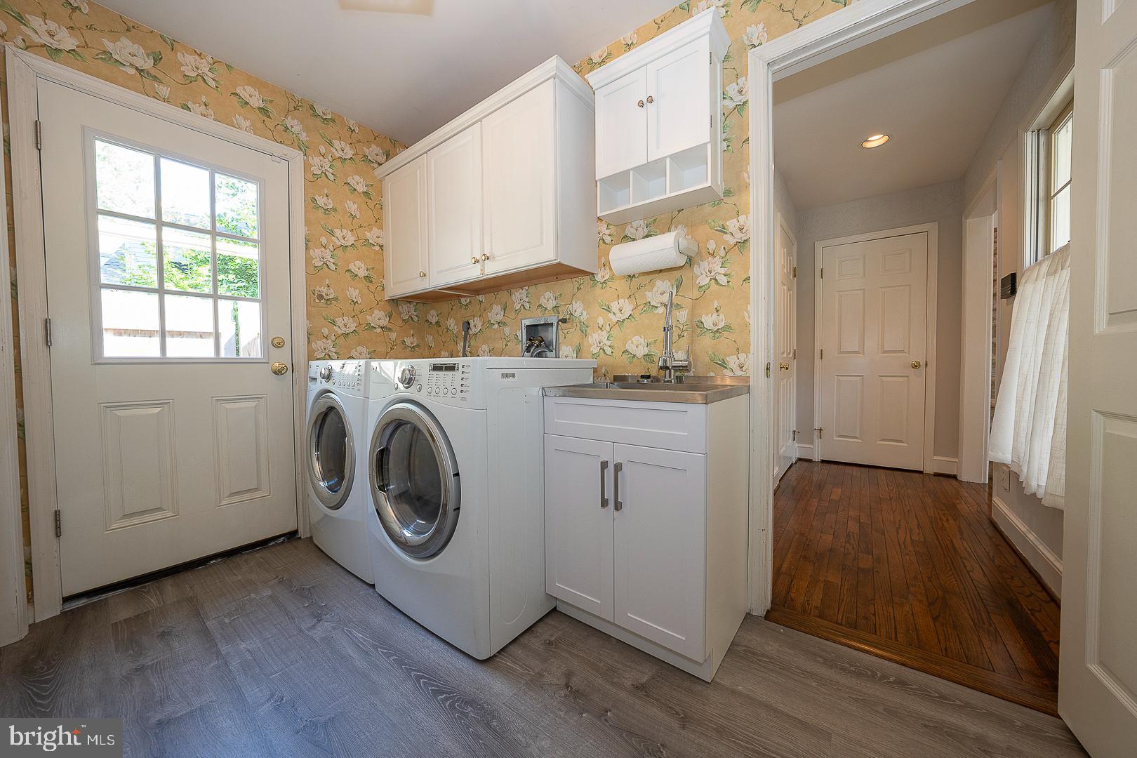 447 Inveraray Road Villanova, PA 19085 - Photo 25 of 71 a utility room with sink dryer and washer