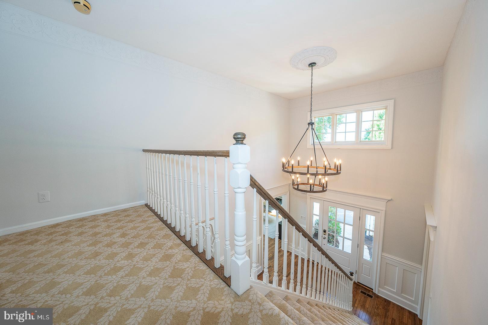 447 Inveraray Road Villanova, PA 19085 - Photo 34 of 71 a view of staircase with railing and chandelier