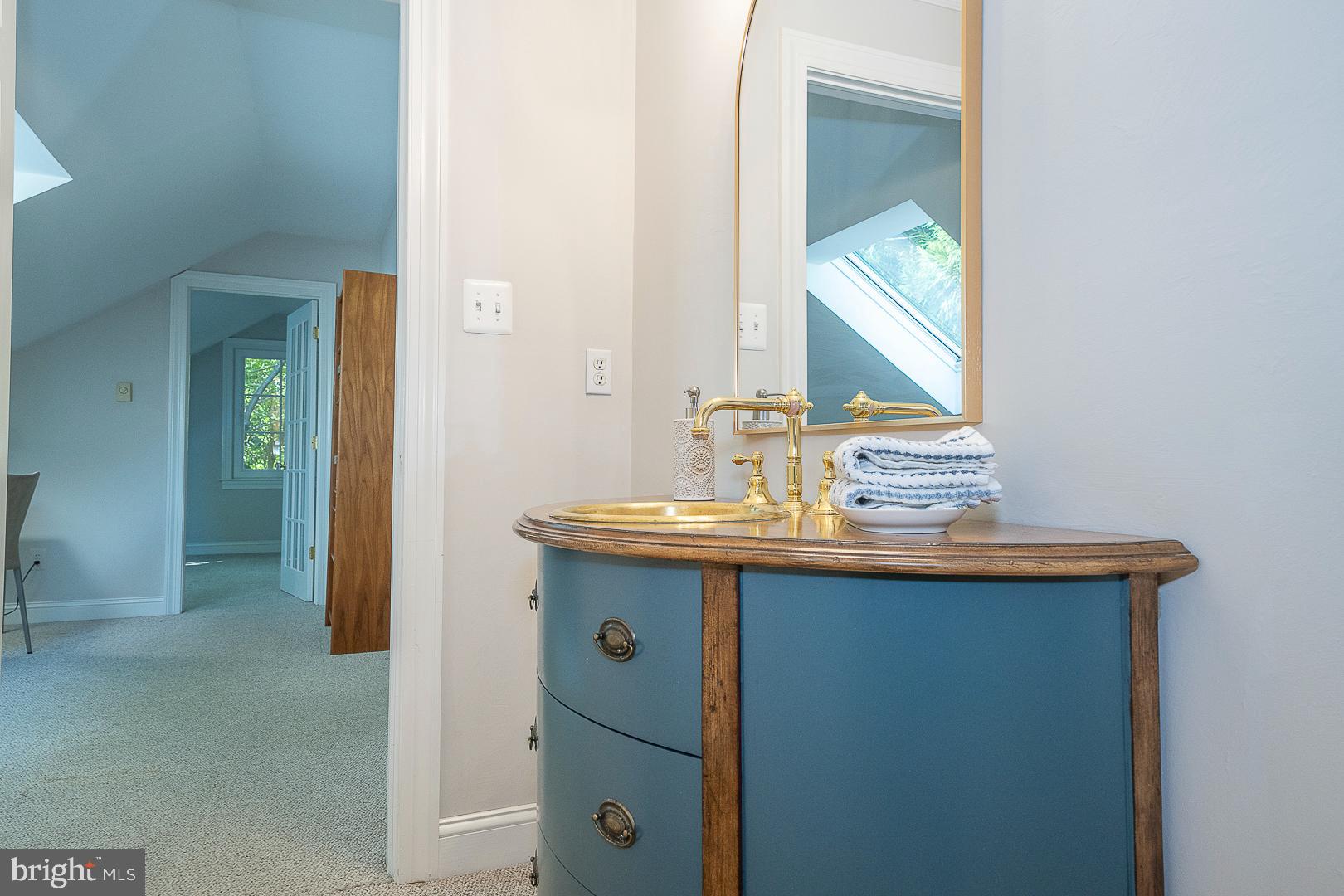 447 Inveraray Road Villanova, PA 19085 - Photo 39 of 71 a bathroom with a sink and a mirror