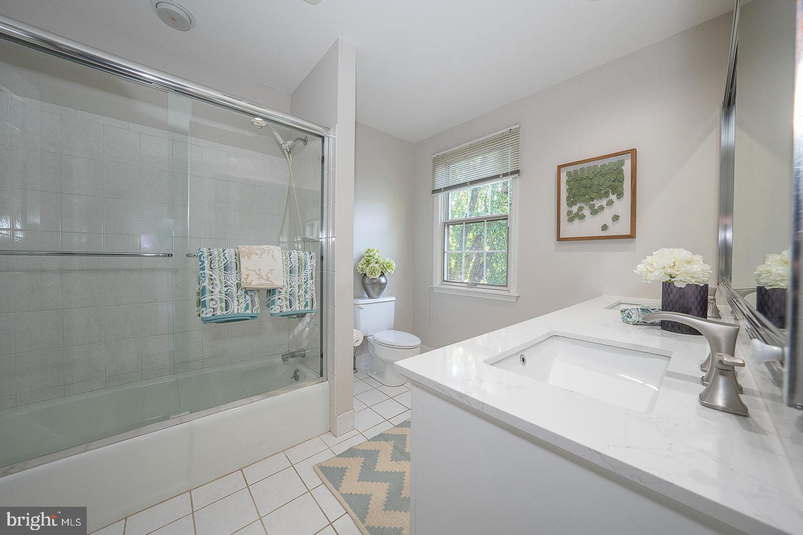 447 Inveraray Road Villanova, PA 19085 - Photo 44 of 71 a bathroom with a sink a bathtub and a shower