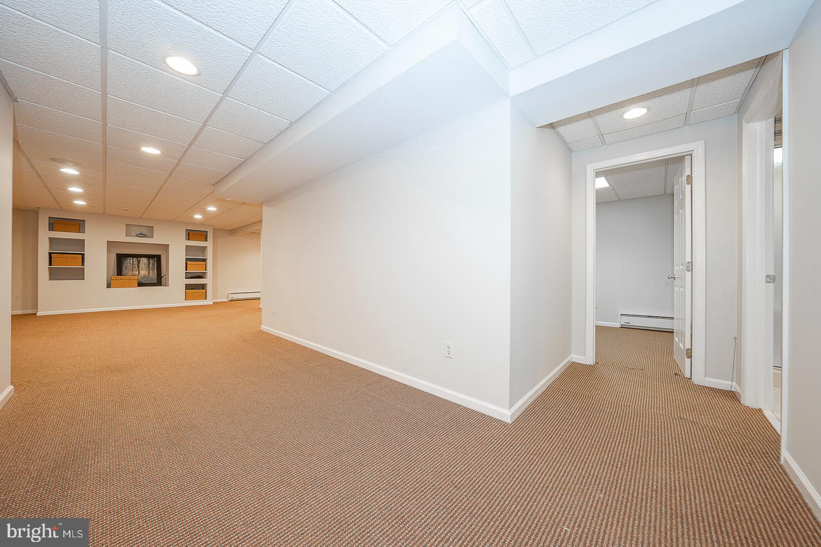 447 Inveraray Road Villanova, PA 19085 - Photo 48 of 71 a view of a big room with wooden floor and a kitchen