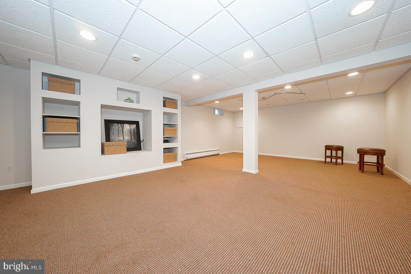 447 Inveraray Road Villanova, PA 19085 - Photo 50 of 71 a view of an empty room with a fireplace