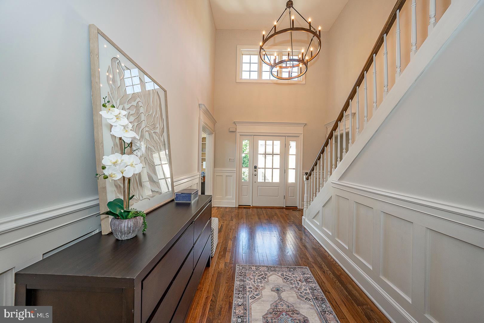 447 Inveraray Road Villanova, PA 19085 - Photo 5 of 71 a hallway with wooden floor chandelier and entryway