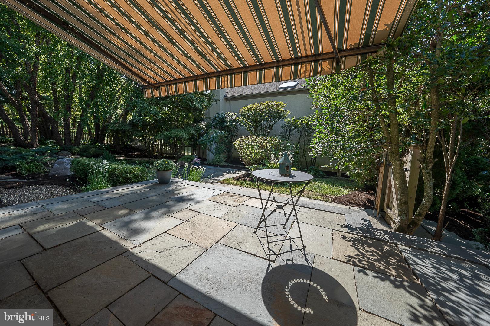 447 Inveraray Road Villanova, PA 19085 - Photo 64 of 71 Flagstone Patio with retractable awning