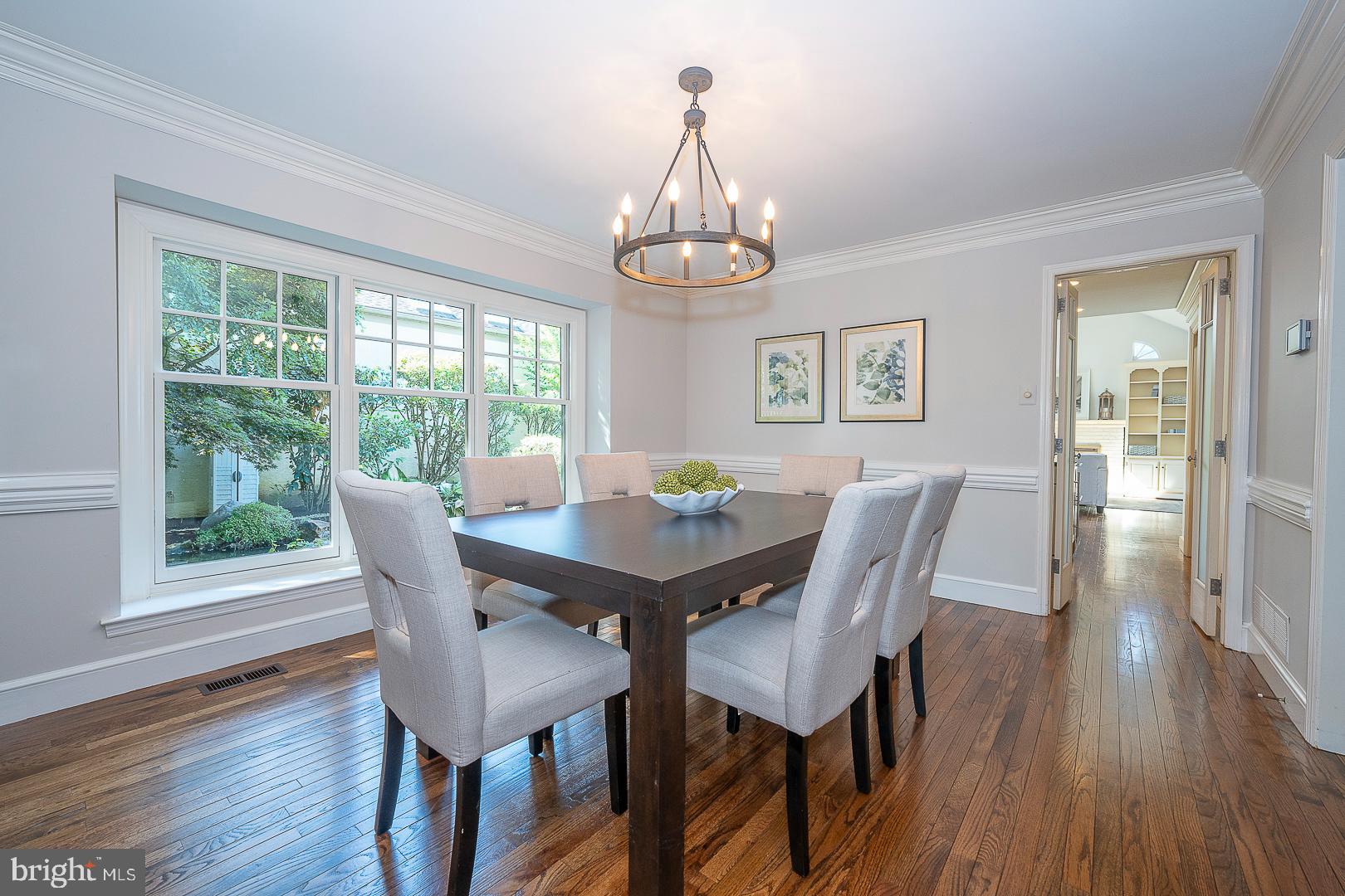 447 Inveraray Road Villanova, PA 19085 - Photo 10 of 71 a view of a dining room with furniture wooden floor and a chandelier