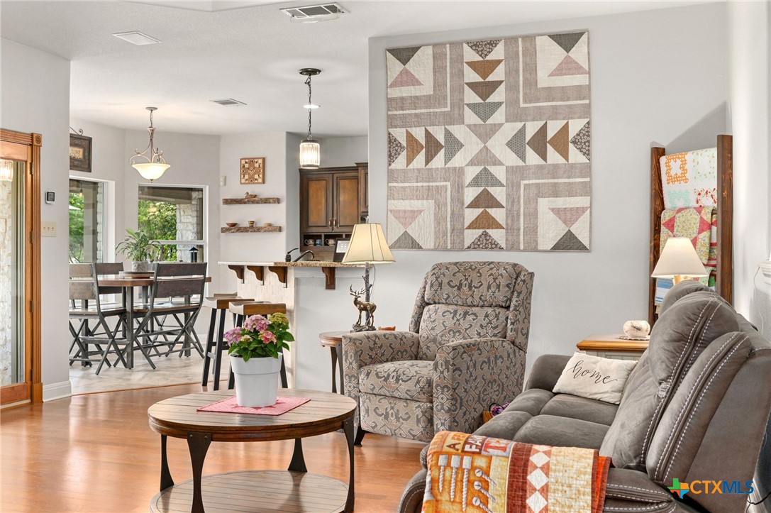 106 Starlight Trail Georgetown, TX 78633 - Photo 14 of 47 Living Room view into the kitchen and Breakfast Room