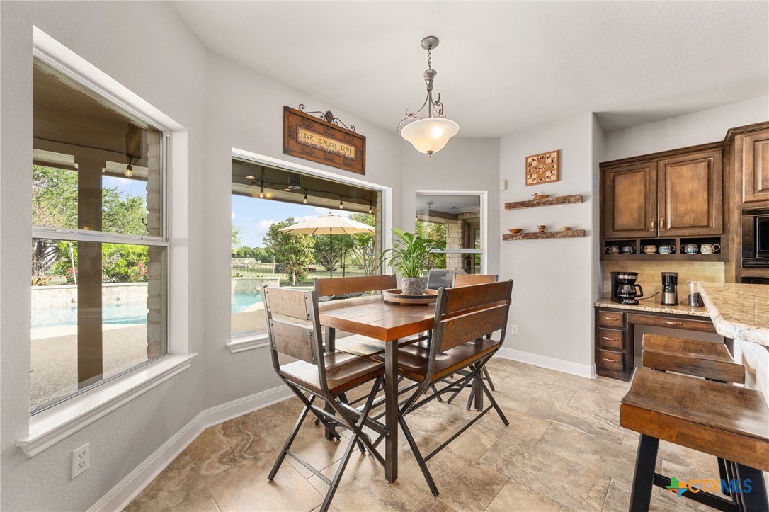 106 Starlight Trail Georgetown, TX 78633 - Photo 16 of 47 Breakfast Room with a Pool View!