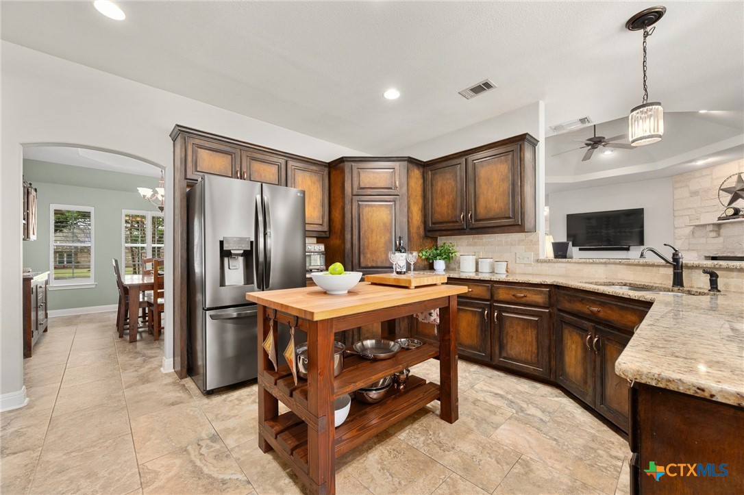 106 Starlight Trail Georgetown, TX 78633 - Photo 19 of 47 Custom Cabinets, Granite, Custom Island and Walk-in Pantry