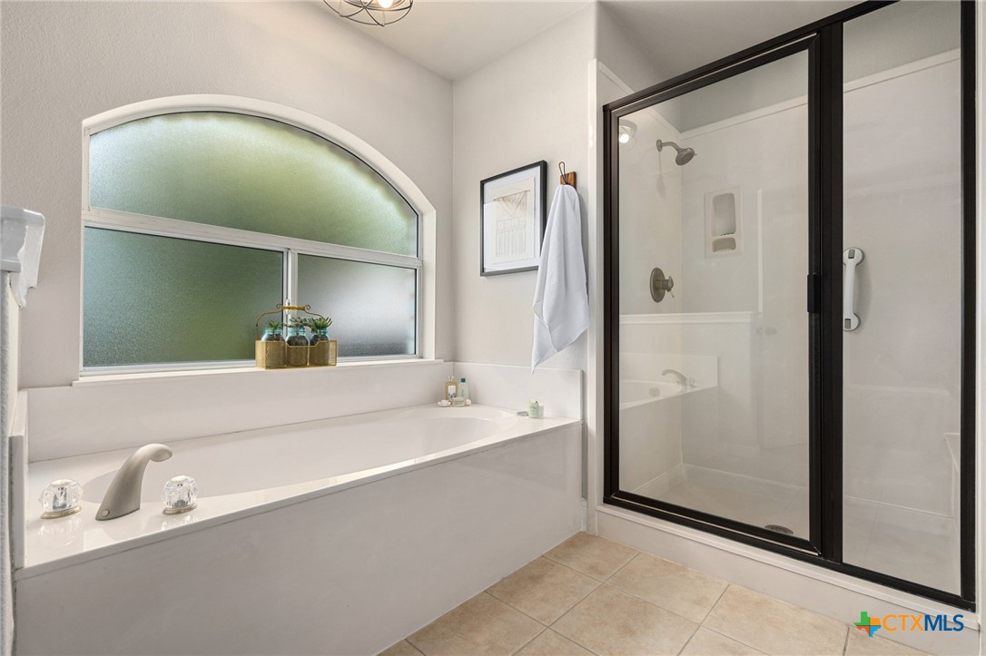 106 Starlight Trail Georgetown, TX 78633 - Photo 24 of 47 Primary Bath - Walk-in Shower and Soaker Tub