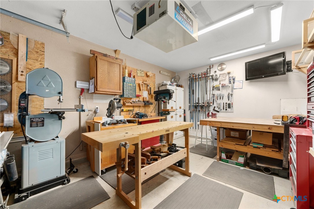 106 Starlight Trail Georgetown, TX 78633 - Photo 34 of 47 1 Bay set up as a workshop - once everything is removed - it's back to the 3rd bay.