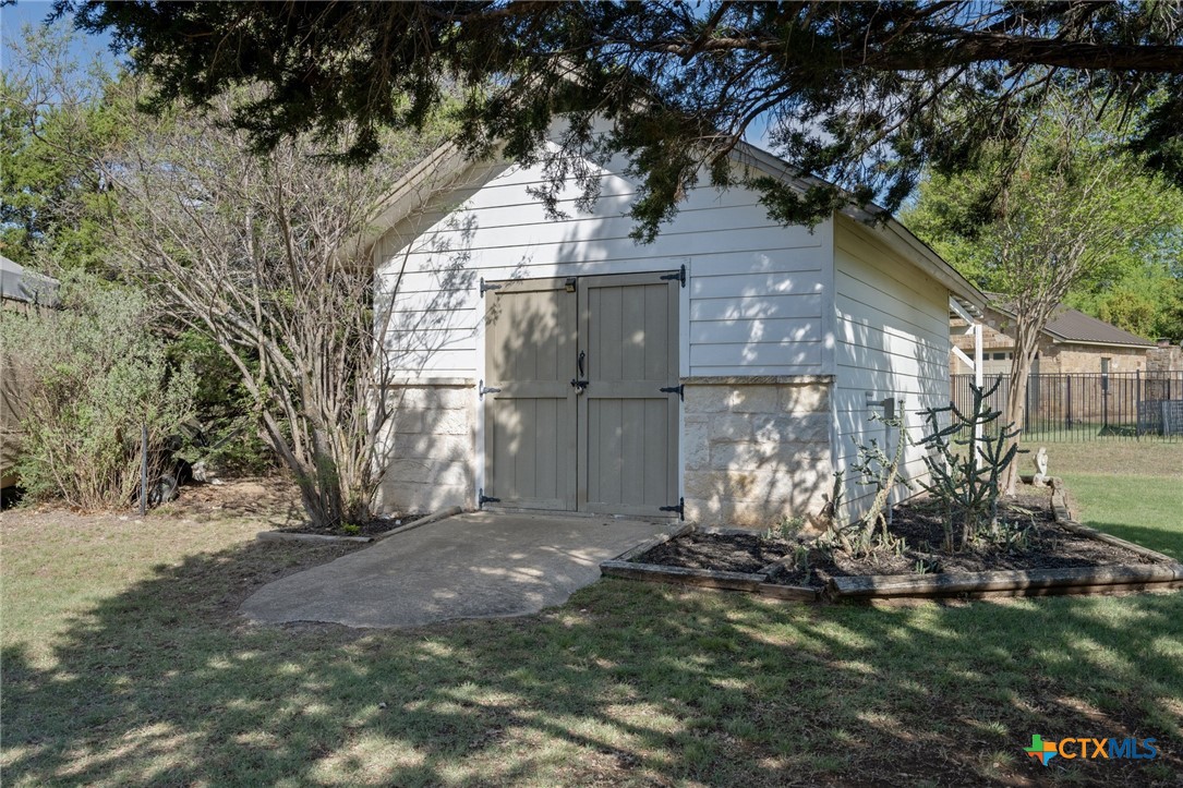 106 Starlight Trail Georgetown, TX 78633 - Photo 42 of 47 Storage building with covered space.