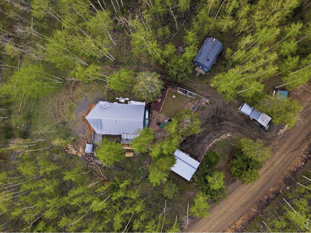 1800 Robinson Hill Road Black Hawk, CO 80422 - Photo 7 of 30 an aerial view of residential house with outdoor space and trees all around