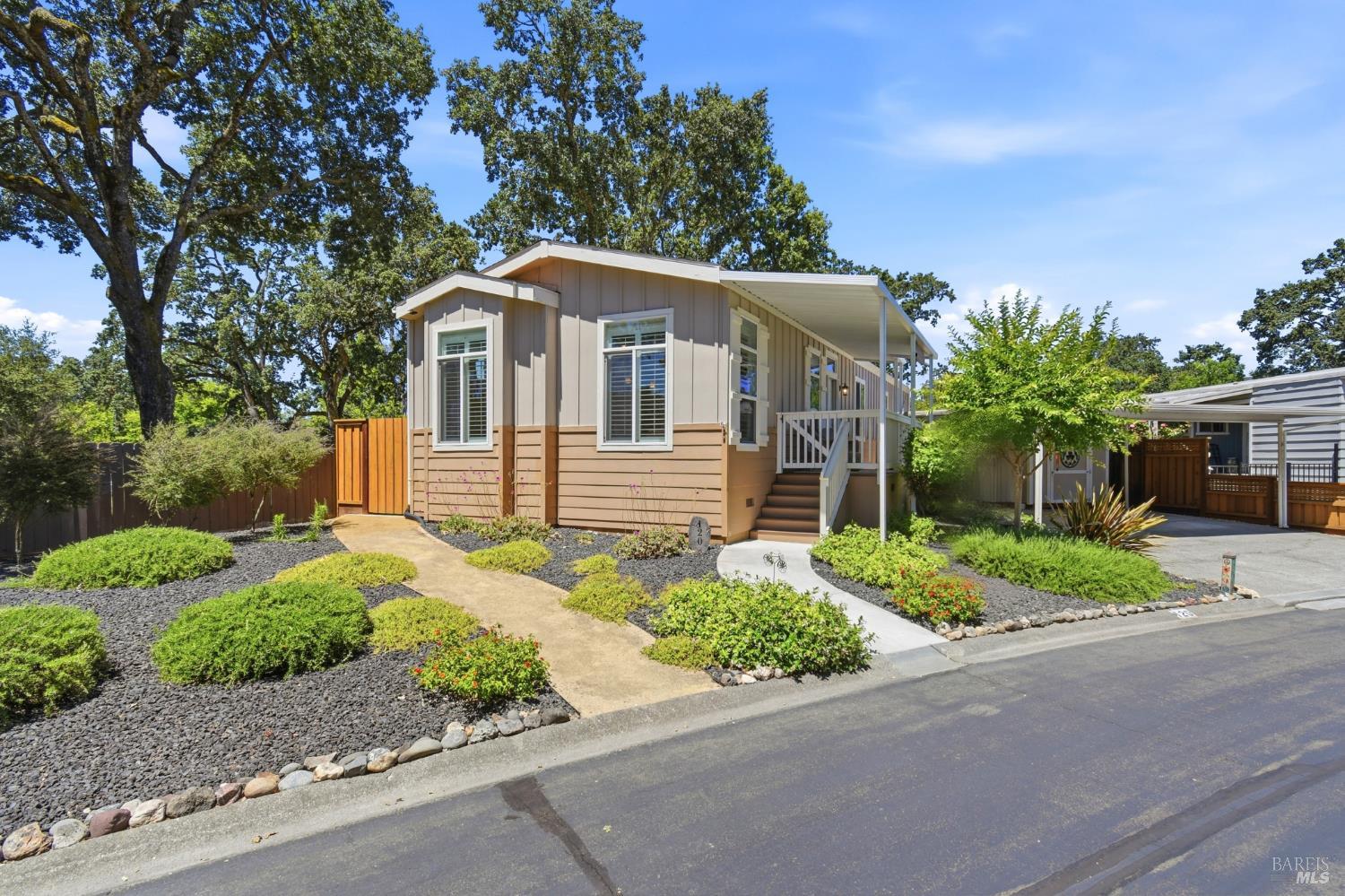 120 Shamrock Circle Santa Rosa, CA 95403 - Photo 8 of 45 a front view of a house with a garden