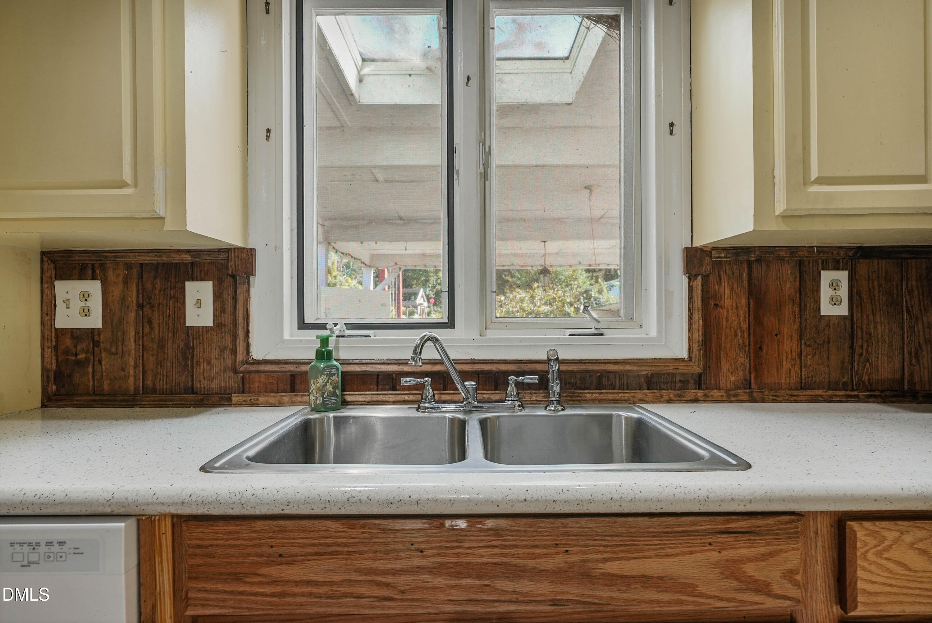 7406 Old Beulah Road Kenly, NC 27542 - Photo 11 of 30 Double basin stainless steel sink with a chrome faucet