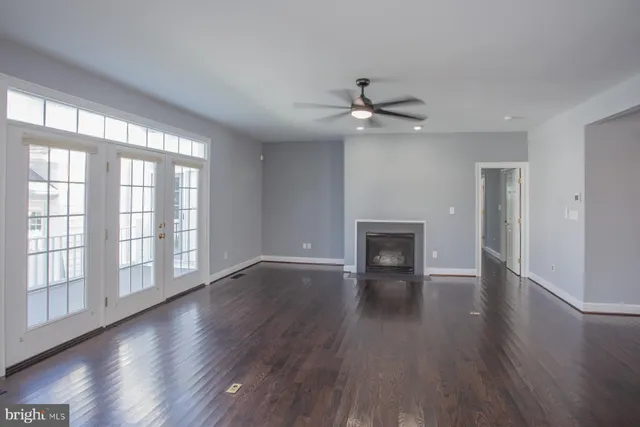 a view of balcony with wooden floor