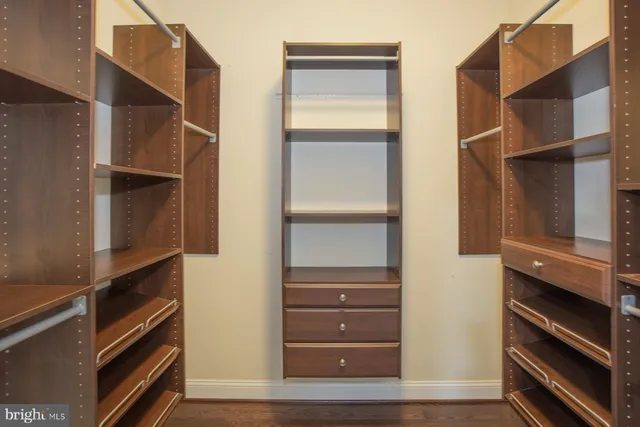 a bathroom with a sink and shower