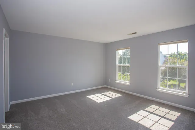 a building with trees in front of it