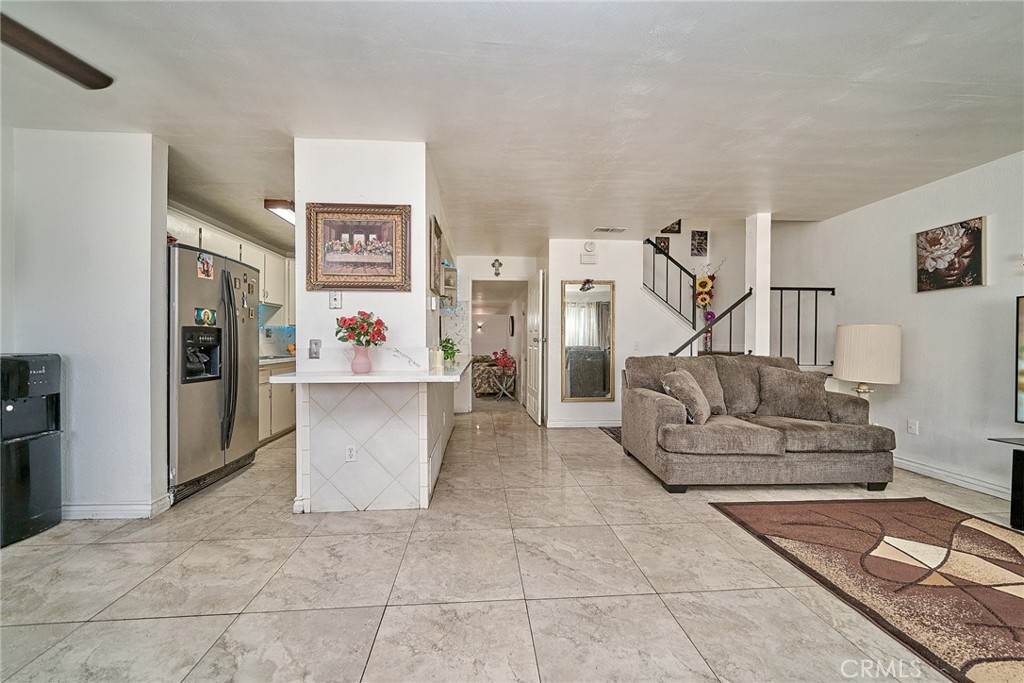 4801 Jackson Street, Unit C Riverside, CA 92503 - Photo 13 of 56 a living room with furniture and a dining table