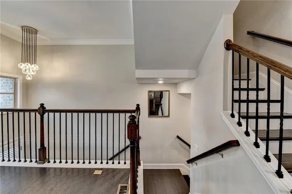 a kitchen with a table and chairs in it