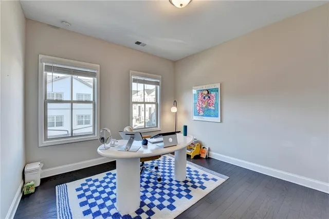 a view of a livingroom with furniture and window