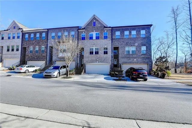a view of a street in front of a building