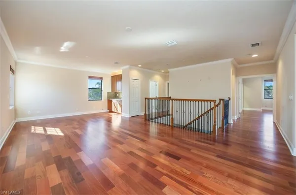 a view of a livingroom with wooden floor