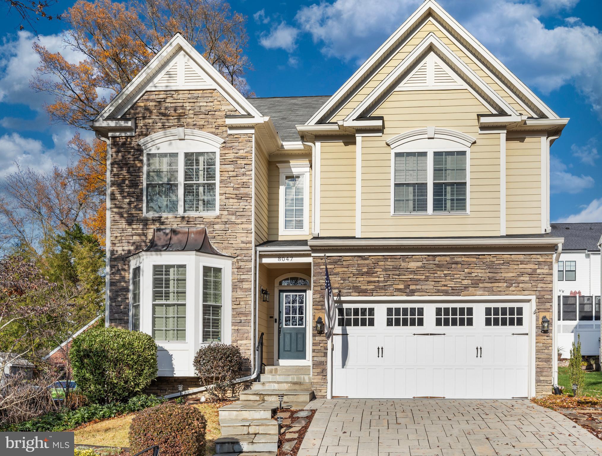Welcome Home! Stone and fiber cement exterior.