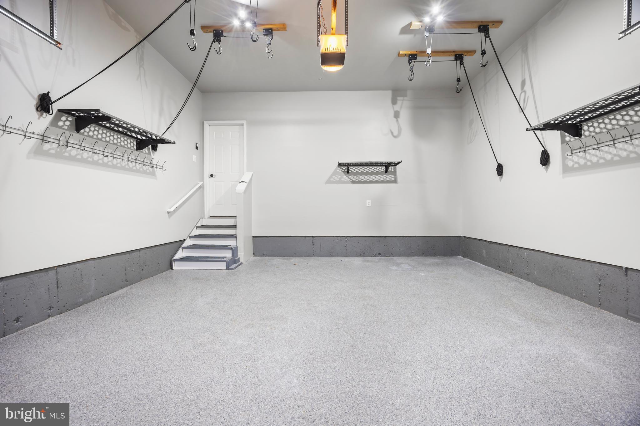 8047 Fairfax Road Alexandria, VA 22308 - Photo 61 of 70 Two Car Garage w/ Epoxy Flooring and Tall Ceiling