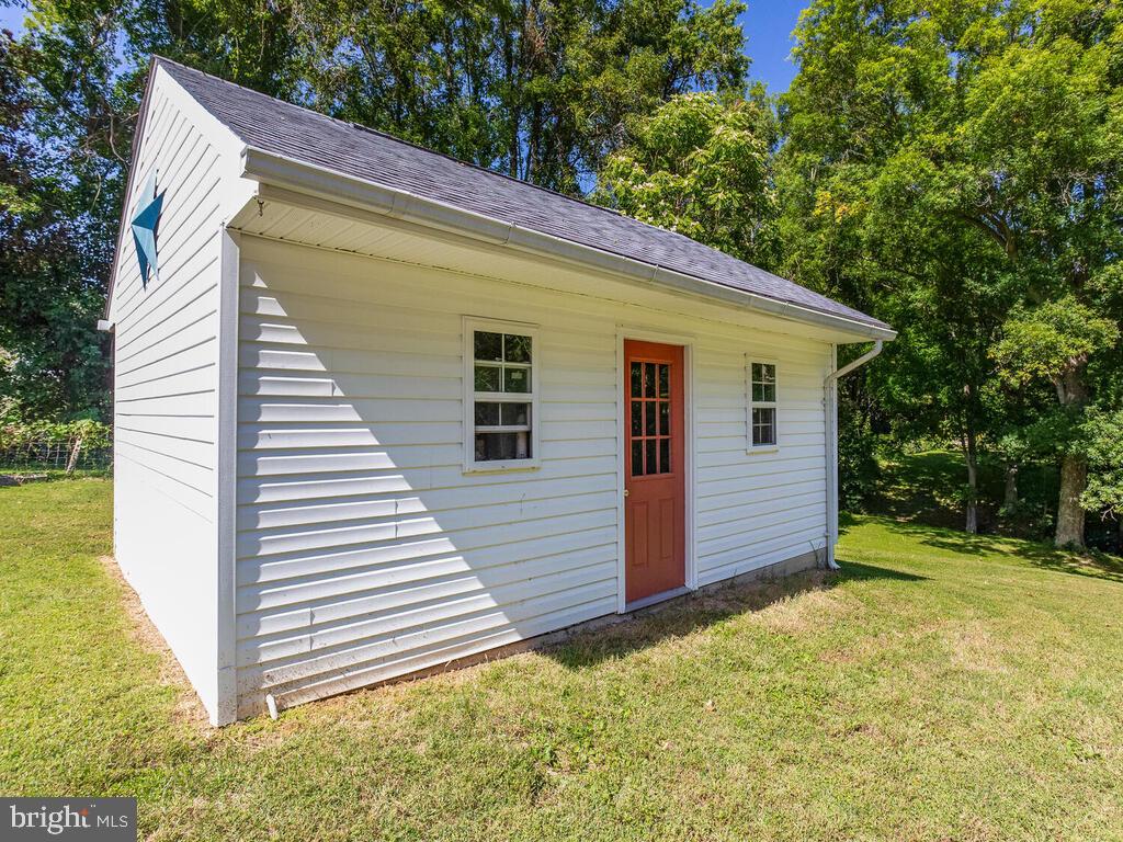 4320 Dunn Road Huntingtown, MD 20639 - Photo 21 of 47 Shed with Electric & Garage style Door