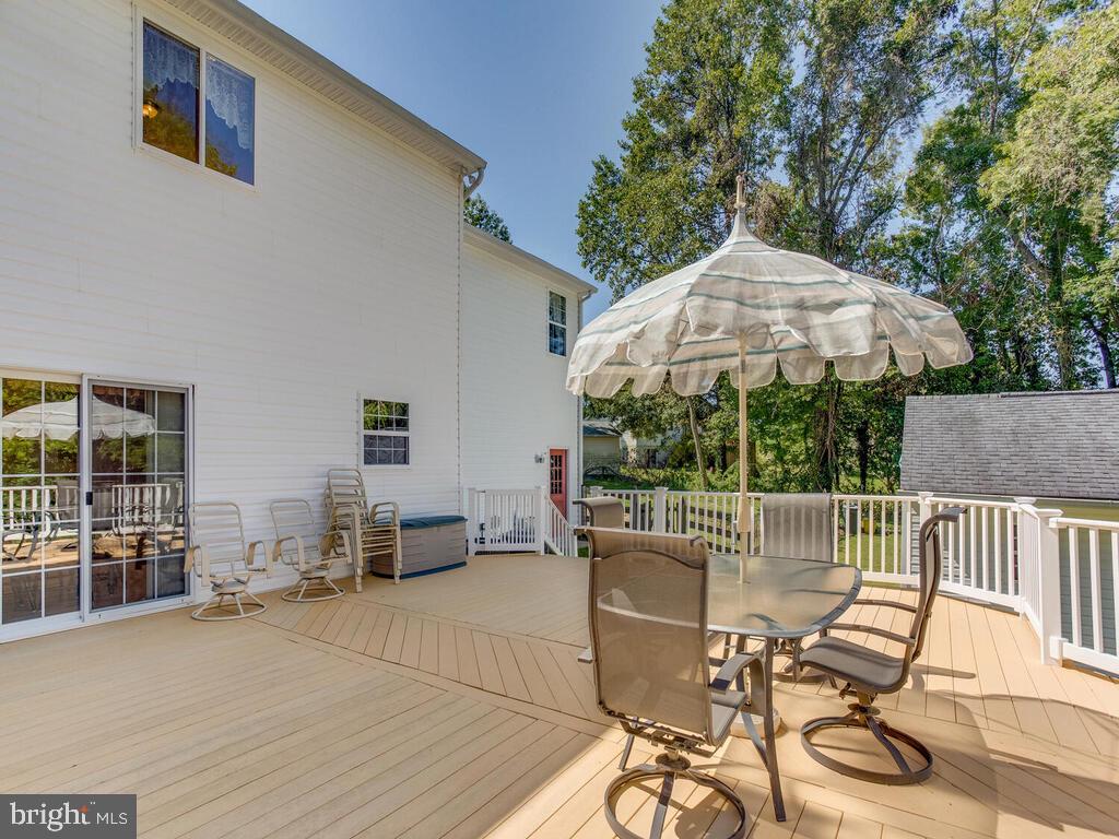 4320 Dunn Road Huntingtown, MD 20639 - Photo 43 of 47 Deck with Stairs to Fenced Rear Yard