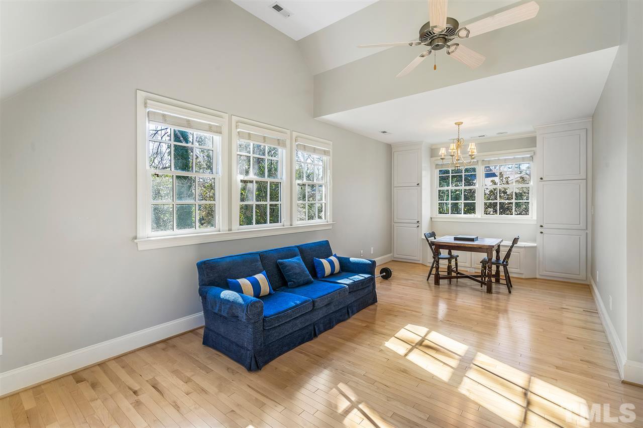 3201 Landor Road Raleigh, NC 27609 - Photo 17 of 25 a living room with furniture and a large window