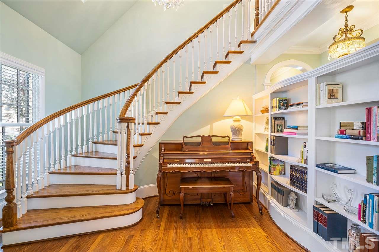 3201 Landor Road Raleigh, NC 27609 - Photo 3 of 25 a view of entryway and hall with wooden floor
