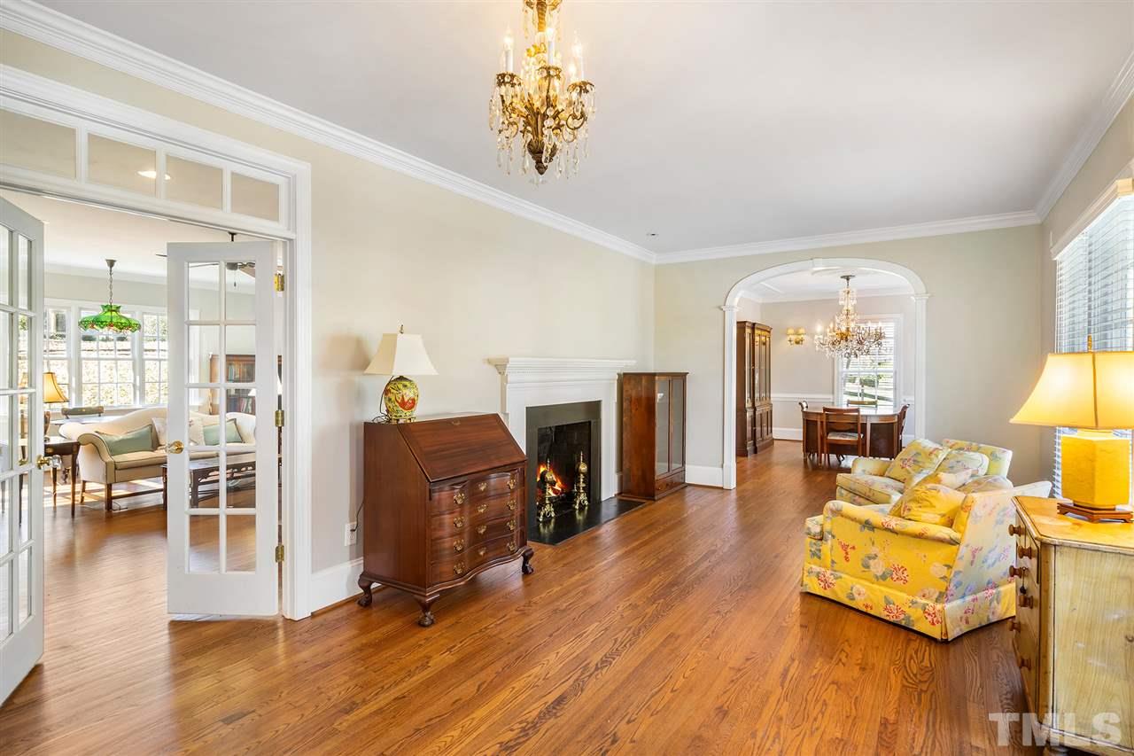 3201 Landor Road Raleigh, NC 27609 - Photo 5 of 25 a living room with furniture and a wooden floor