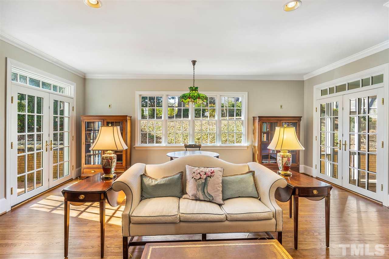 3201 Landor Road Raleigh, NC 27609 - Photo 10 of 25 a living room with furniture and a large window