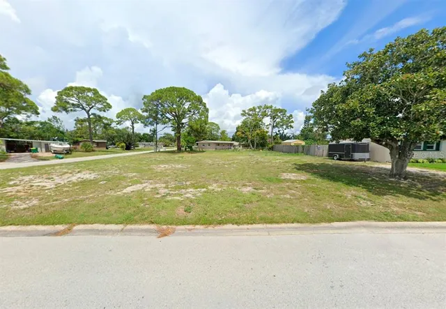a view of a playground with basketball court