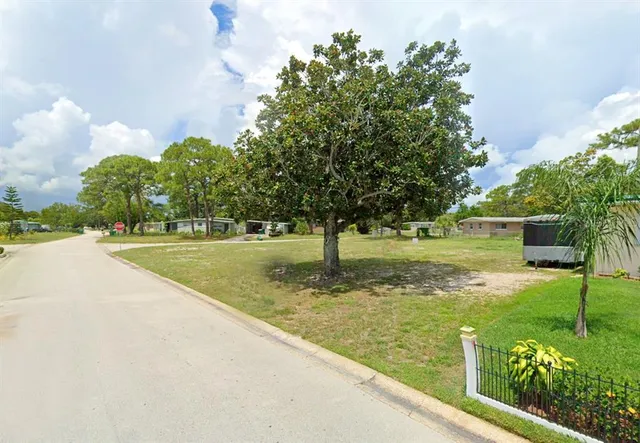 a view of a garden with a slide