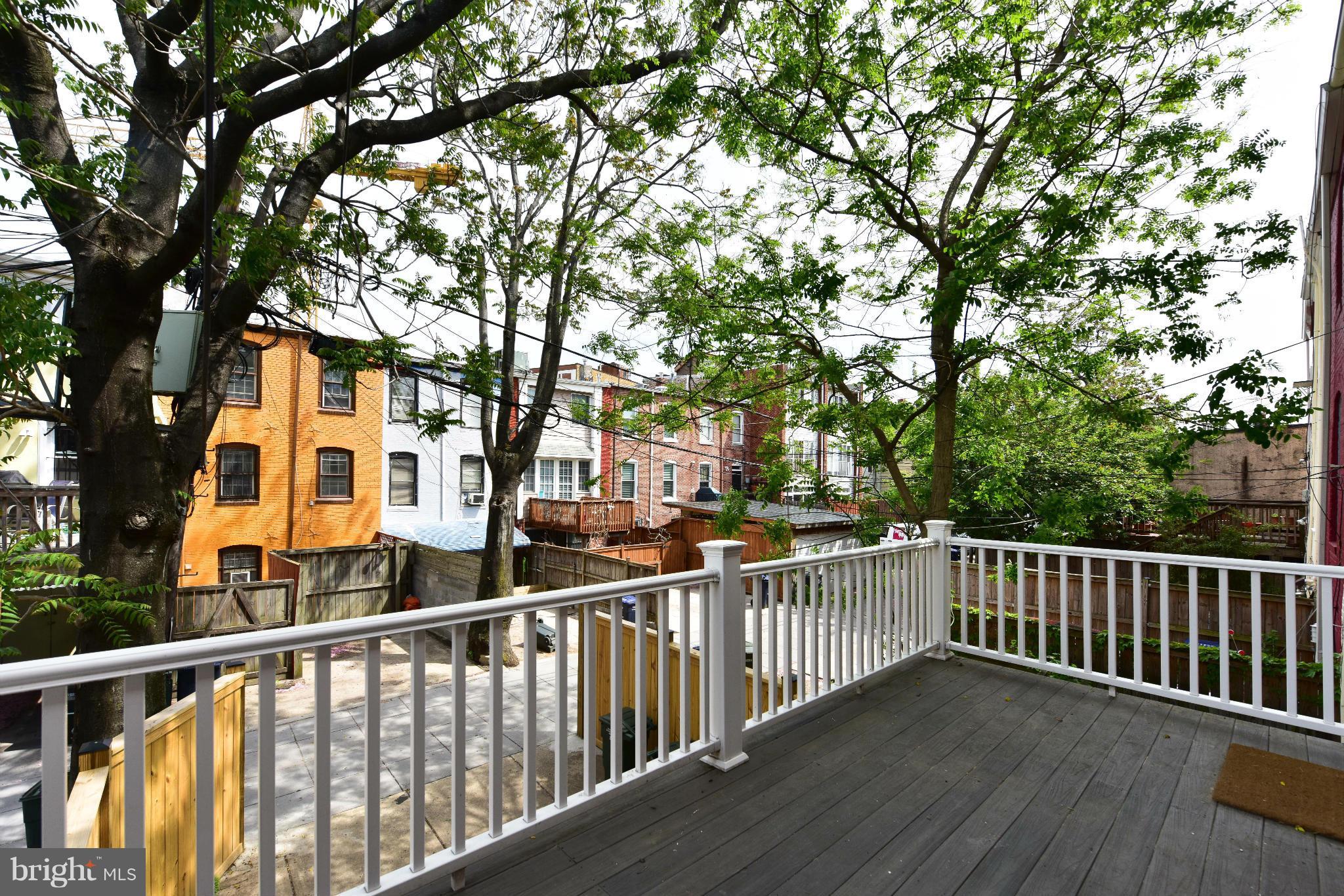 1749 Seaton Street Northwest Washington, DC 20009 - Photo 21 of 22 a view of a street from a balcony