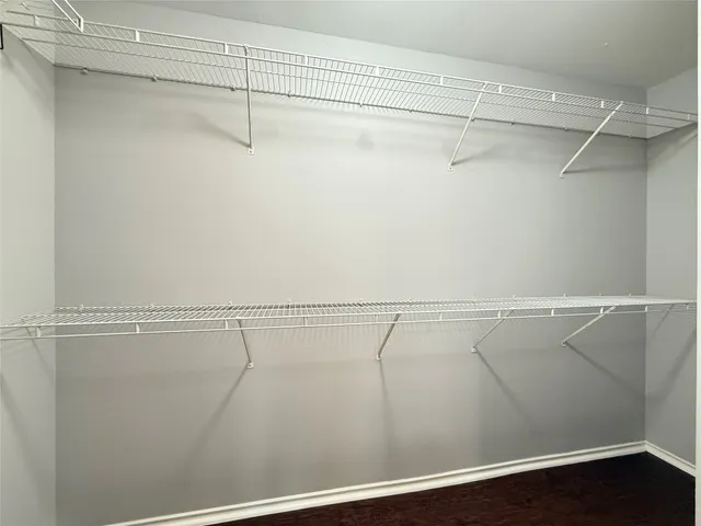 a view of a room with racks on the wall