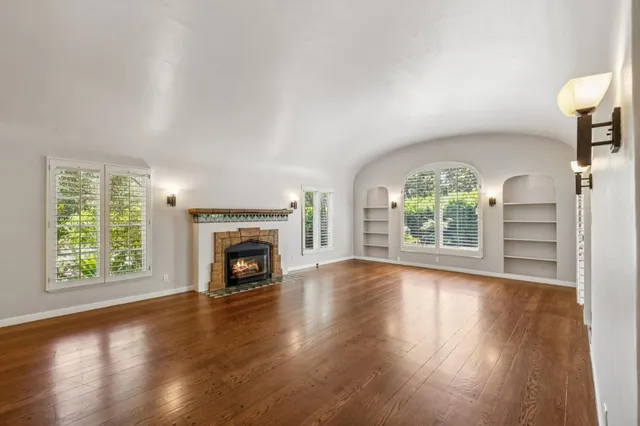 a kitchen that has a sink and a stove