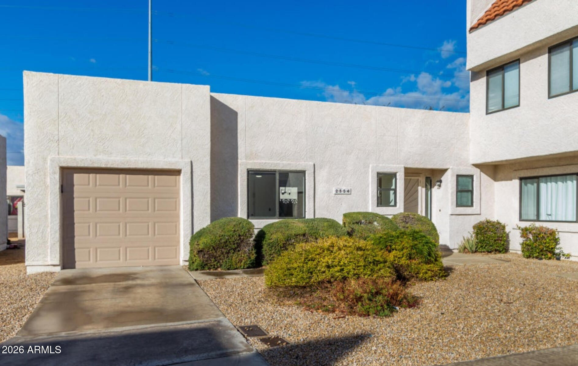 2554 West Kathleen Road Phoenix, AZ 85023 - Photo 4 of 22 a view of a house with a garage