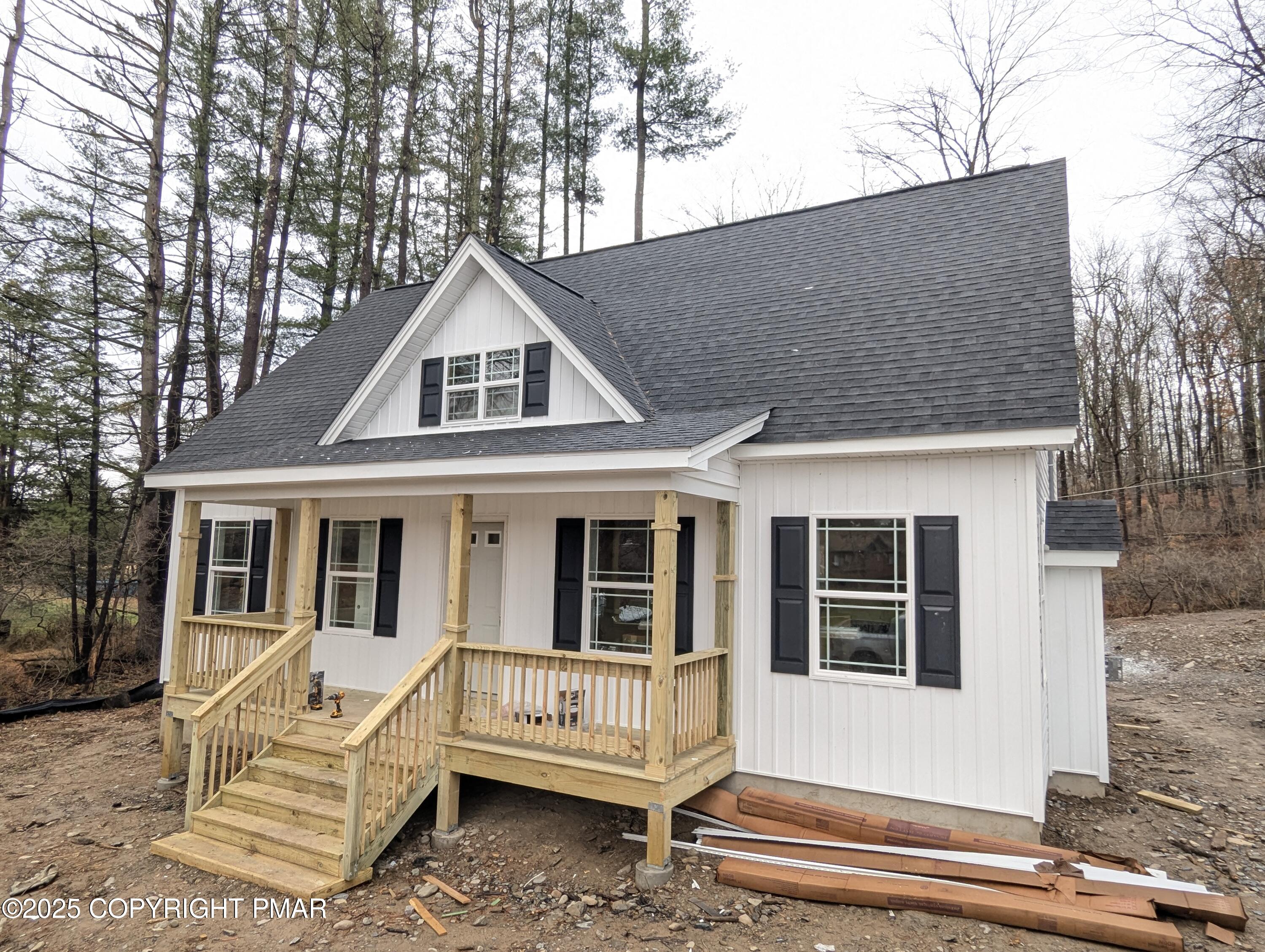 Lot 5 Murray Hill Road East Stroudsburg, PA 18302 - Photo 3 of 15 a front view of a house with a yard