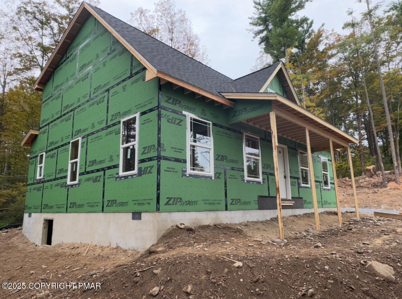 Lot 5 Murray Hill Road East Stroudsburg, PA 18302 - Photo 4 of 15 a front view of a house with a garden