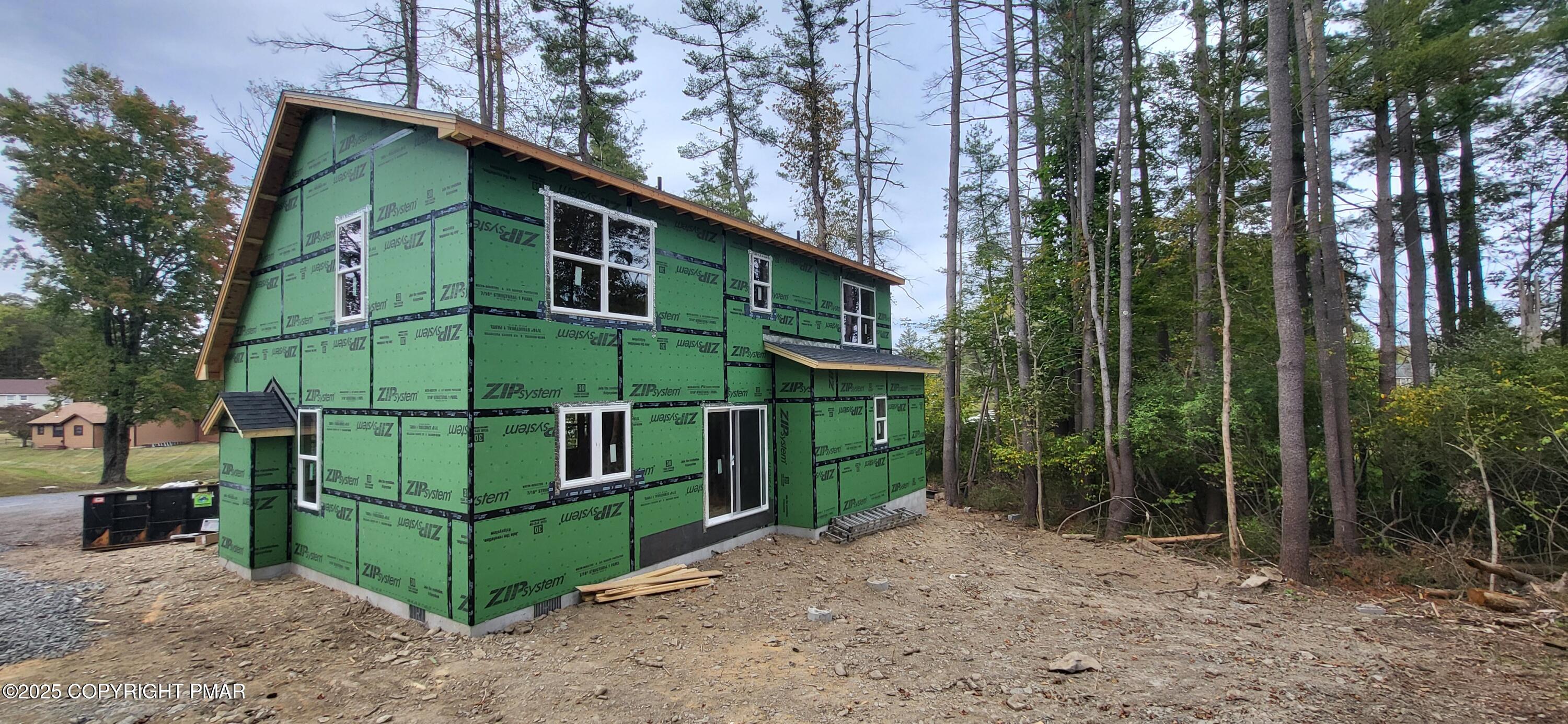 Lot 5 Murray Hill Road East Stroudsburg, PA 18302 - Photo 5 of 15 a view of a house with a yard and large trees
